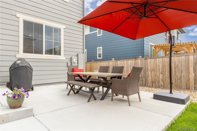 view of patio with a grill