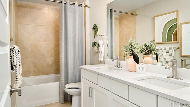 full bathroom with tile patterned flooring, vanity, shower / bathtub combination with curtain, and toilet