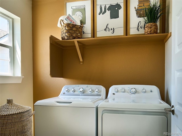 laundry area with separate washer and dryer