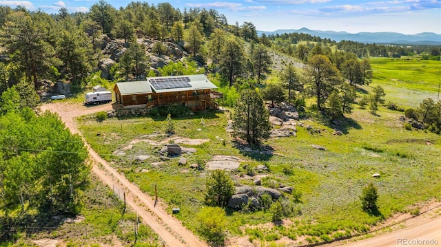 3980 County Rd 71, Guffey, CO 80820 - aerial view of property and surrounding area featuring a mountainous background