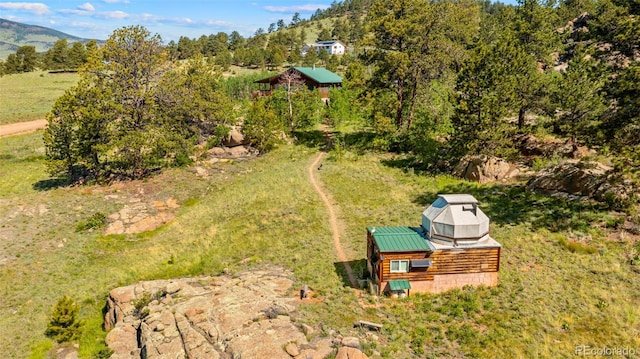 3980 County Rd 71, Guffey, CO 80820 - drone / aerial view of a mountainous background