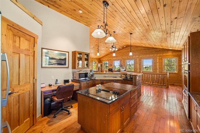 3980 County Rd 71, Guffey, CO 80820 - office space with lofted ceiling, wooden ceiling, and hardwood / wood-style floors