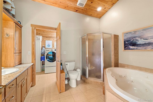 3980 County Rd 71, Guffey, CO 80820 - bathroom with washer / dryer, a stall shower, a jetted tub, vanity, and wooden ceiling