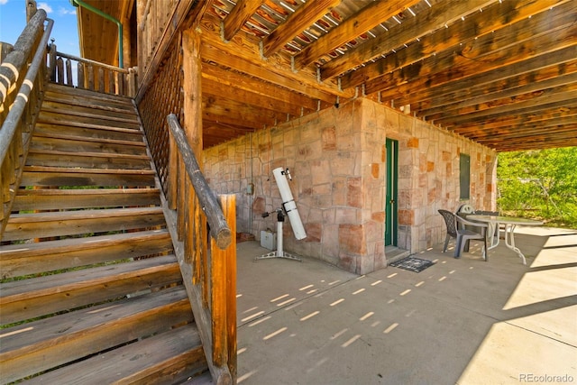 3980 County Rd 71, Guffey, CO 80820 - view of patio featuring electric panel and stairway