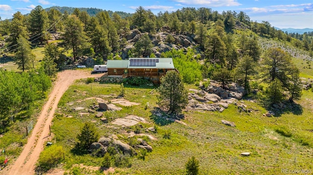3980 County Rd 71, Guffey, CO 80820 - view of subject property with mountains and a forest
