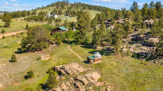 3980 County Rd 71, Guffey, CO 80820 - aerial view of property and surrounding area with a mountain backdrop