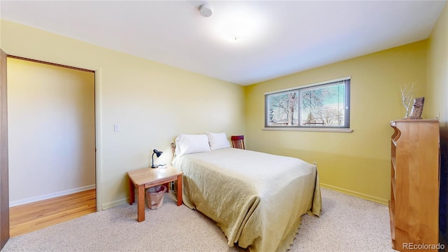 bedroom featuring baseboards