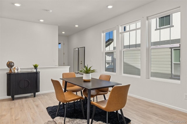 dining area with light wood-type flooring