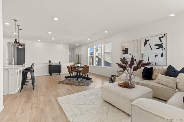 living room featuring light wood-type flooring