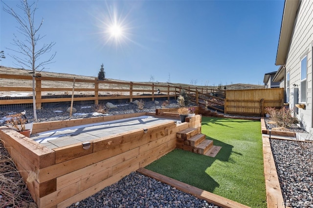 17412 W 93rd Pl, Arvada, CO 80007 - fenced backyard with a vegetable garden
