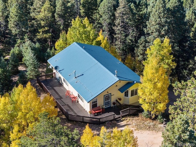 view from above of property featuring a forest