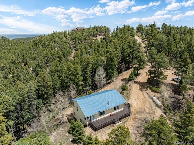 view from above of property featuring a forest