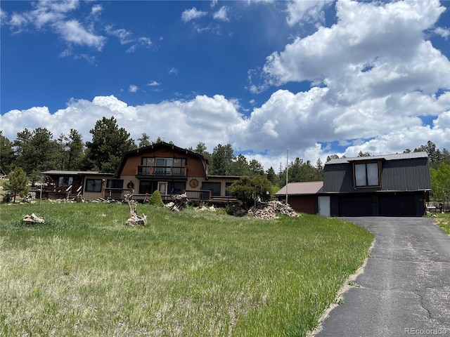 60 Pawnee Path, Lake George, CO 80827 - view of yard featuring a garage and driveway