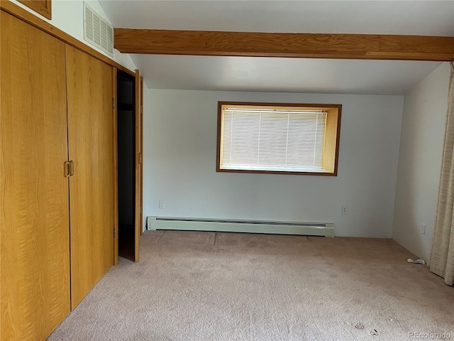 60 Pawnee Path, Lake George, CO 80827 - unfurnished bedroom featuring a baseboard radiator, carpet, beamed ceiling, and a closet