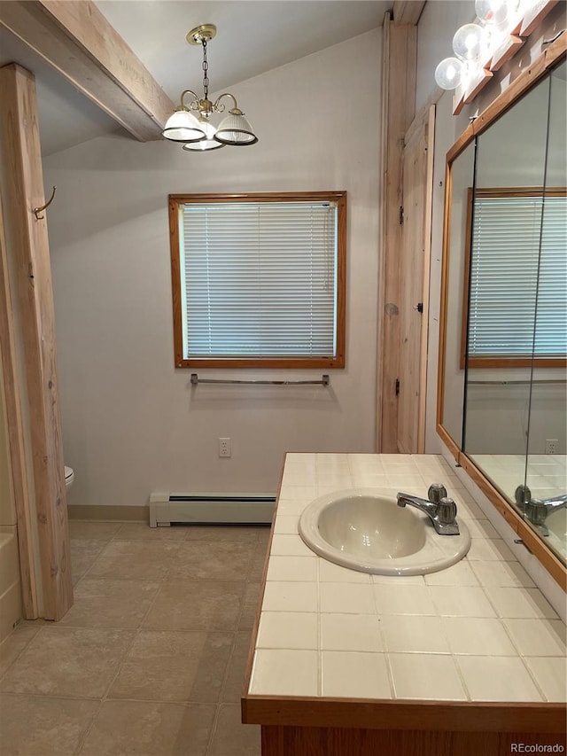 60 Pawnee Path, Lake George, CO 80827 - full bathroom featuring a baseboard radiator, a chandelier, vanity, and vaulted ceiling