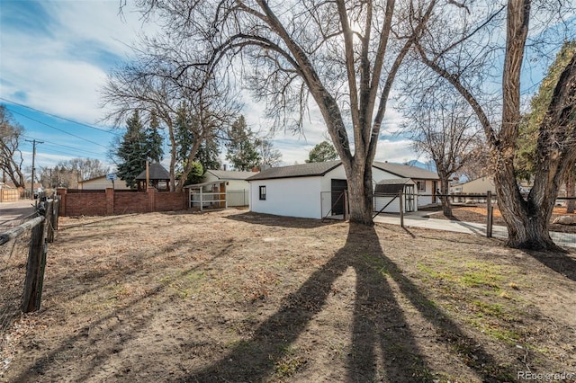 view of yard featuring fence