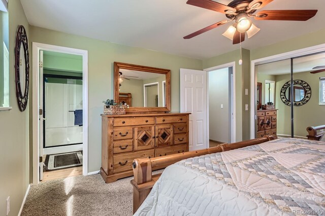 bedroom featuring baseboards, a ceiling fan, a closet, and connected bathroom