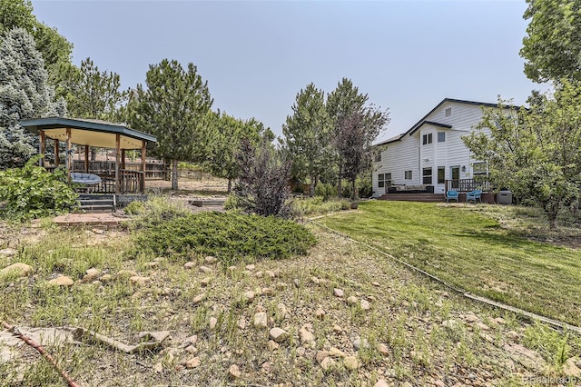 view of yard with a deck