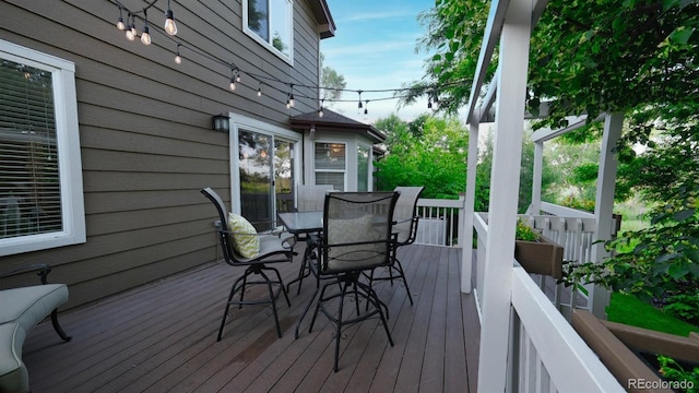 5150 Morning Glory Pl, Highlands Ranch, CO 80130 - wooden deck with outdoor dining area