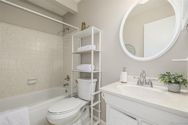 bathroom with bathtub / shower combination, vanity, and toilet