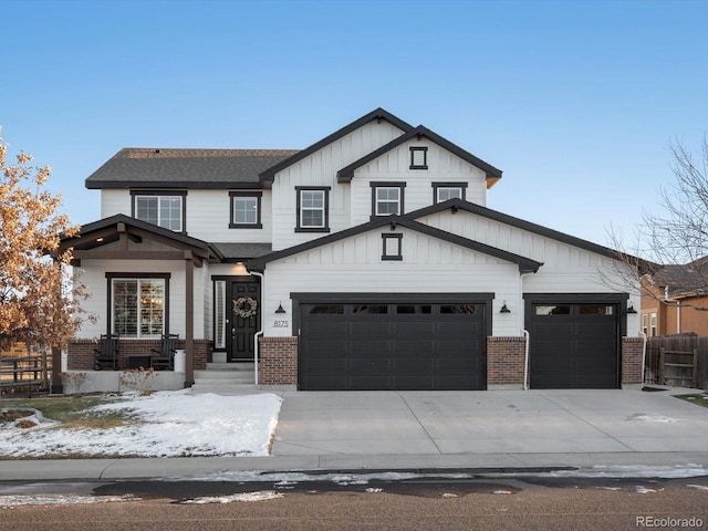 modern farmhouse style home featuring a garage