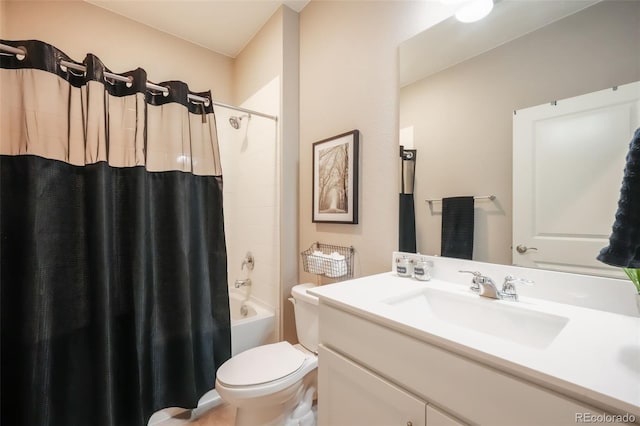 bathroom featuring toilet, shower / bath combo, and vanity