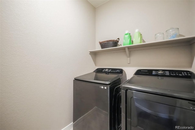 laundry area with laundry area and washer and dryer