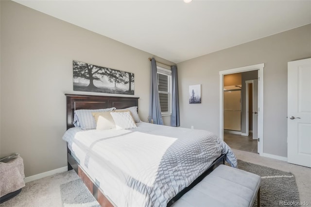 carpeted bedroom featuring baseboards