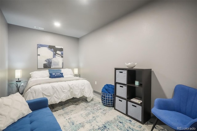 bedroom with visible vents and baseboards