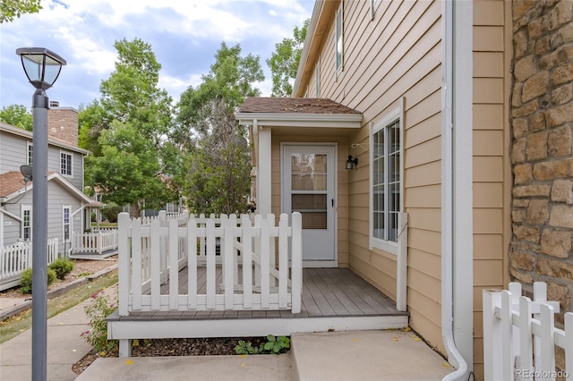 8463 Everett Way Unit B, Arvada, CO 80005 - entrance to property featuring a wooden deck