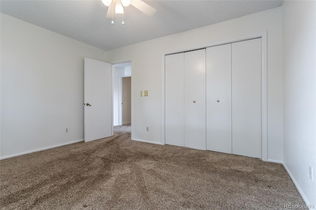 8463 Everett Way Unit B, Arvada, CO 80005 - unfurnished bedroom with carpet, a closet, and a ceiling fan