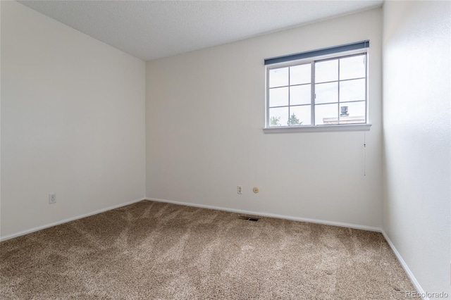 8463 Everett Way Unit B, Arvada, CO 80005 - carpeted empty room featuring baseboards