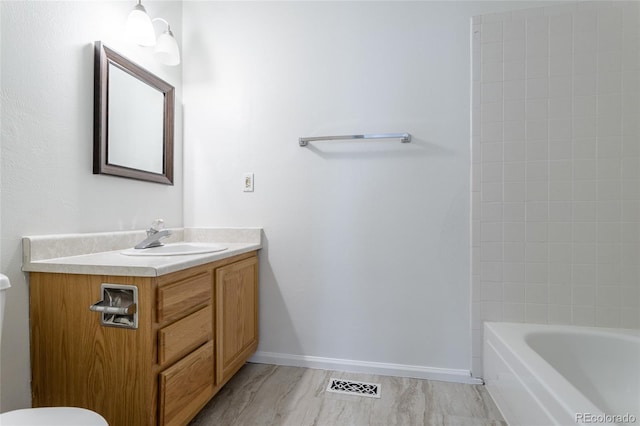 8463 Everett Way Unit B, Arvada, CO 80005 - full bathroom featuring vanity and toilet
