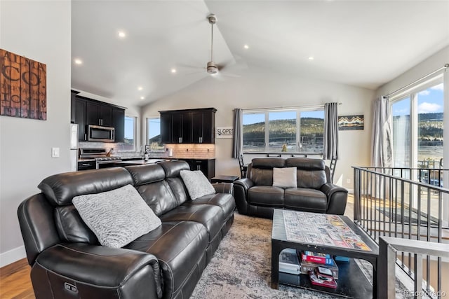 255 Flannigan Cir, Alma, CO 80420 - living area featuring light wood-style floors, baseboards, ceiling fan, and a water view