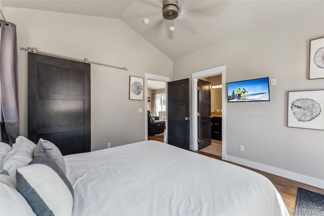 255 Flannigan Cir, Alma, CO 80420 - bedroom featuring ceiling fan, ensuite bath, baseboards, wood finished floors, and lofted ceiling
