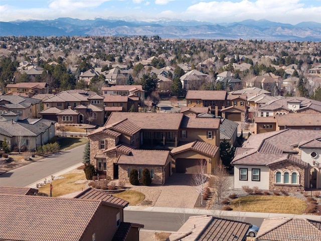 drone / aerial view featuring a mountain view