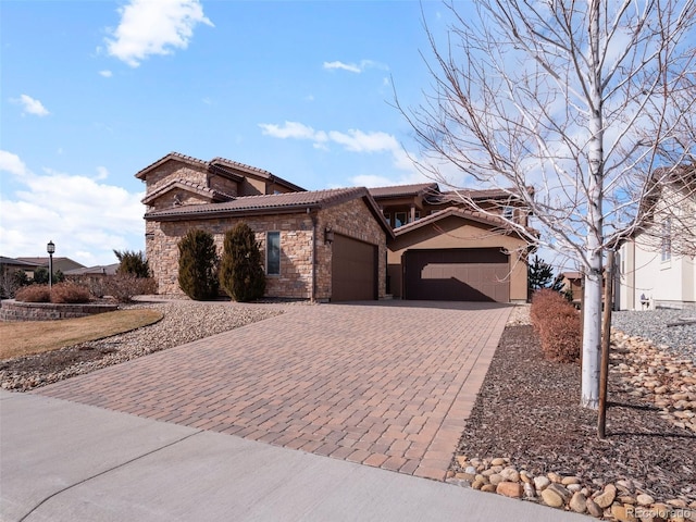 view of front of home with a garage