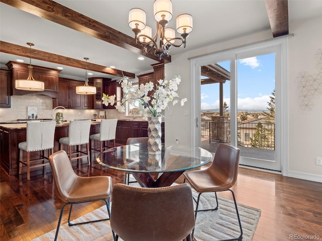 dining room with a chandelier, dark hardwood / wood-style flooring, and beam ceiling