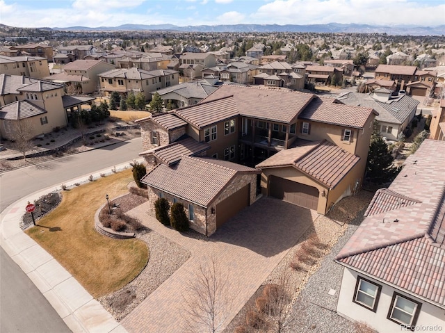 drone / aerial view featuring a mountain view