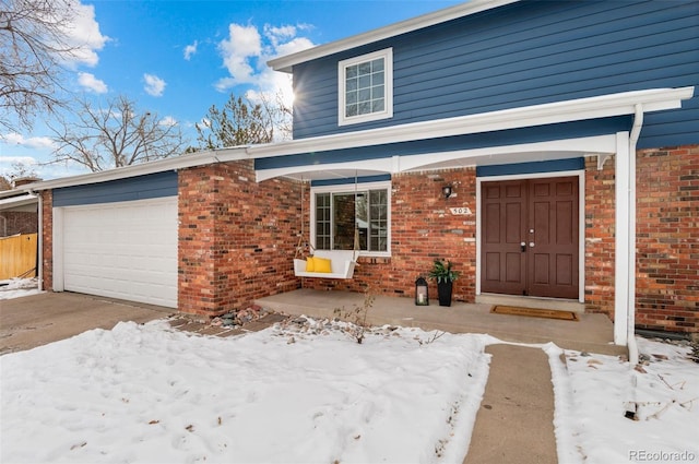 view of front of property featuring a garage