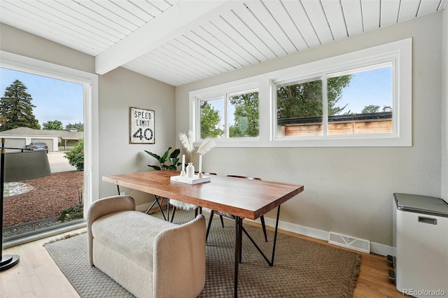 1440 S Clermont St, Denver, CO 80222 - home office featuring plenty of natural light, wooden ceiling, wood finished floors, and baseboards