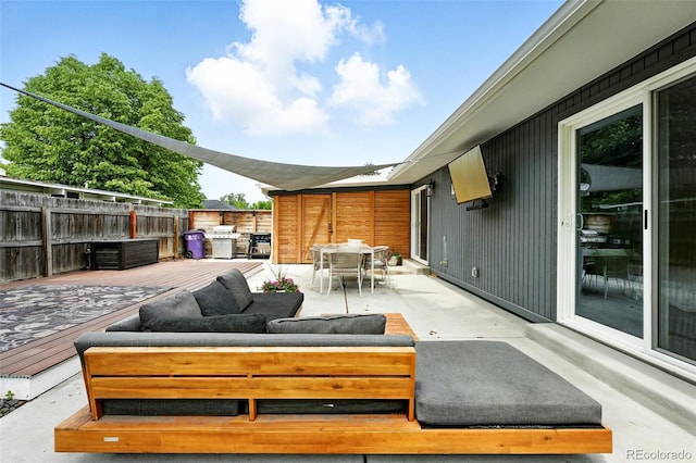 1440 S Clermont St, Denver, CO 80222 - view of patio featuring an outdoor hangout area, a wooden deck, outdoor dining area, and area for grilling
