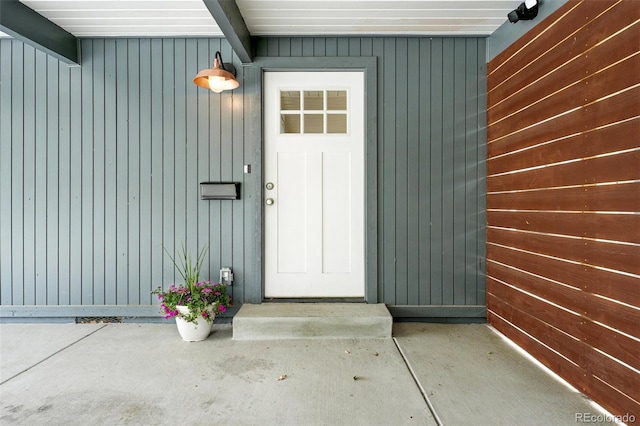 1440 S Clermont St, Denver, CO 80222 - view of exterior entry featuring board and batten siding