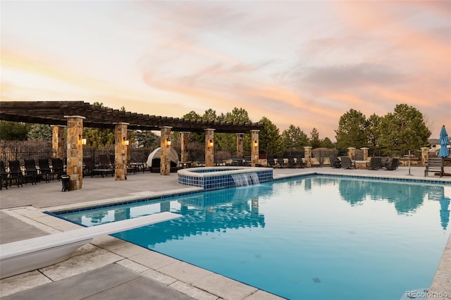 pool at dusk featuring a pergola, a patio, and a pool with connected hot tub