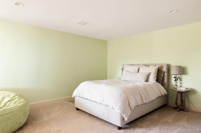 carpeted bedroom with baseboards, recessed lighting, and visible vents