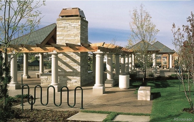 view of home's community featuring a pergola