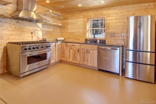 1245 Blossom Rd, Woodland Park, CO 80863 - kitchen with wooden ceiling, stainless steel appliances, wall chimney exhaust hood, and wood walls
