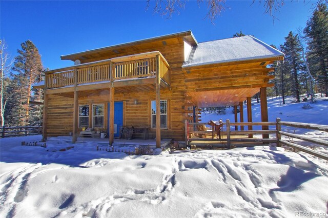 1245 Blossom Rd, Woodland Park, CO 80863 - view of front of home with a balcony