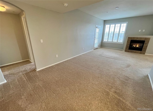 unfurnished living room with carpet floors