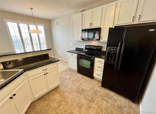 kitchen with white cabinetry, decorative light fixtures, sink, and black appliances